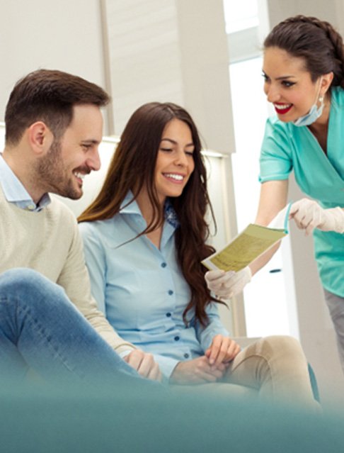 patients discussing the cost of traditional braces in Tucson