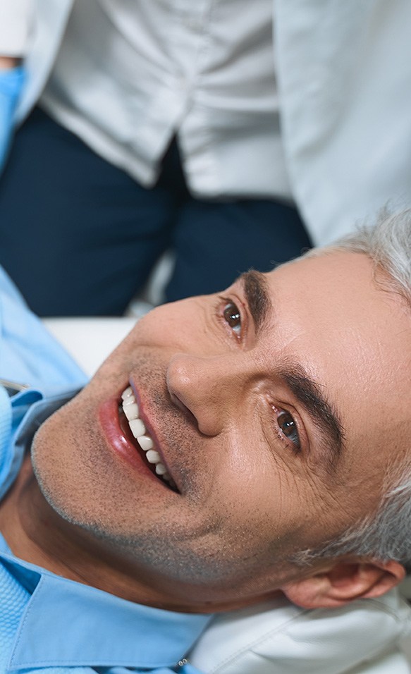 Man smiling at the dentist