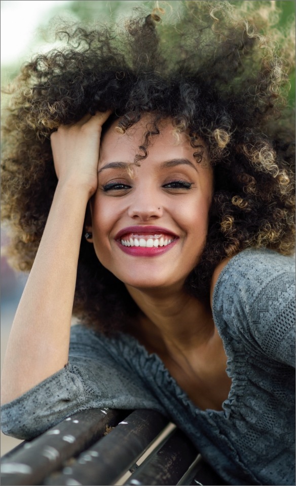 Woman with gorgeous smile after cosmetic dentistry