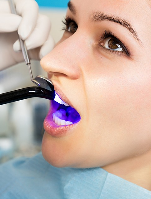 Patient receiving cosmetic dental bonding