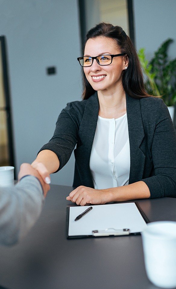 Woman discussing dental insurance with Marana Arizona dentist