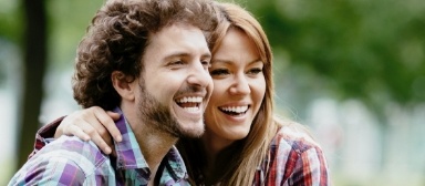 Man and woman with healthy smiles after preventive dentistry