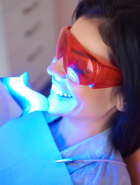 man getting teeth whitening in Marana