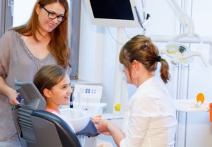 mother and child visiting children’s dentist