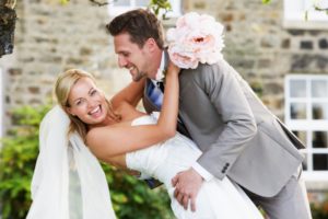 smiling bride with flowers