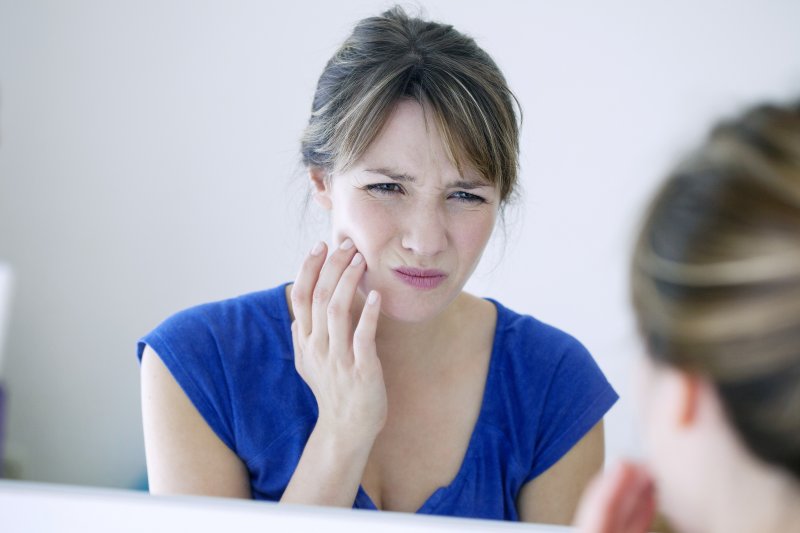 Woman with jaw pain